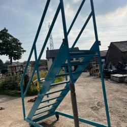 EX-BAE PORTABLE MOBILE STEEL STEPS / STAIRS ON WHEELS.