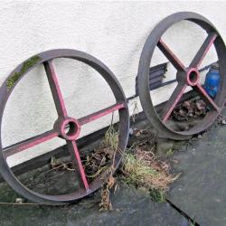 4no OLD CAST IRON WHEELS .