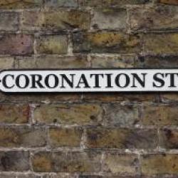 CAST IRON CORONATION STREET SIGN APPROX 2FT WIDE.